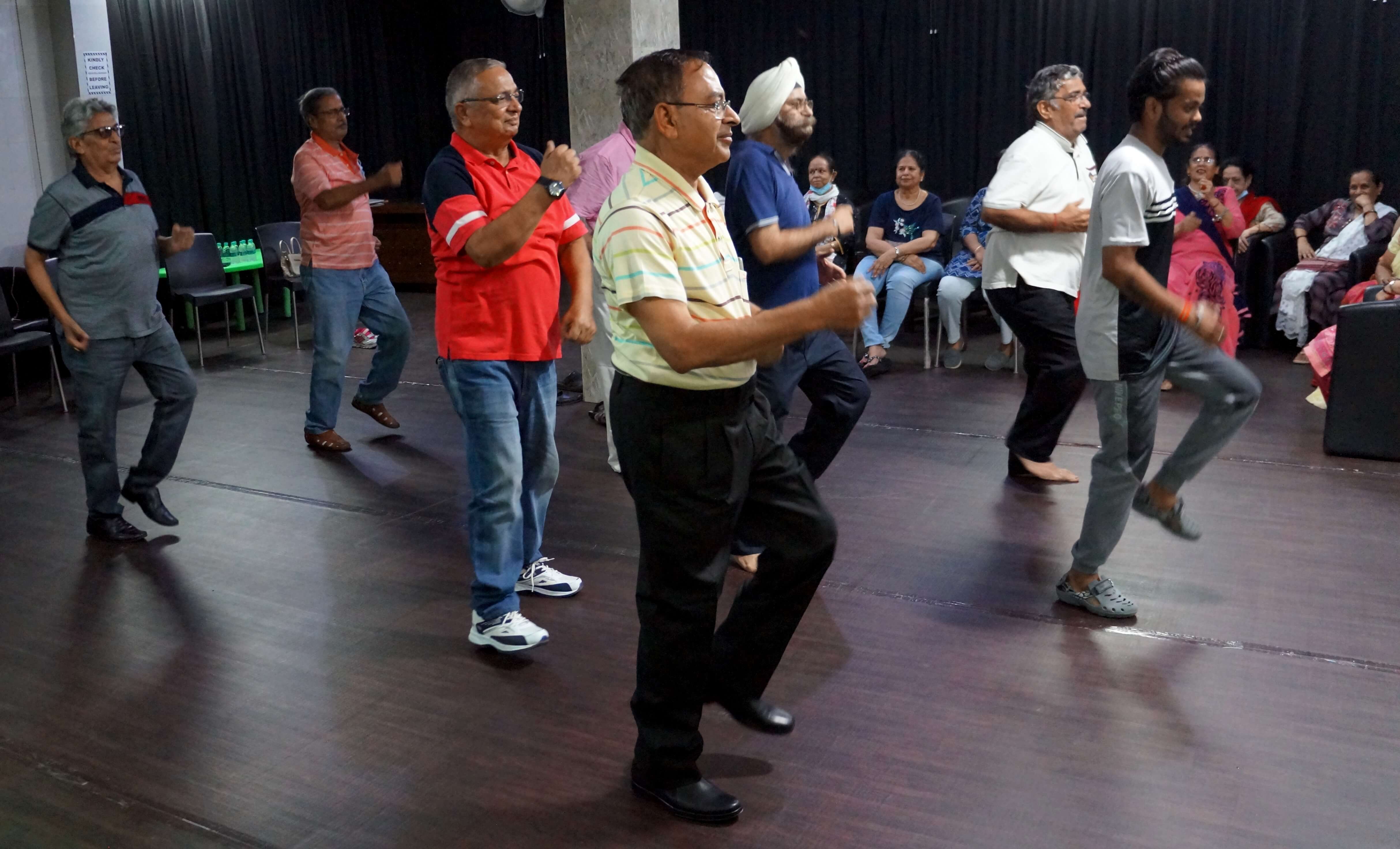 I-Serve members dancing together